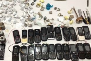 Os celulares e uma grande quantidade de drogas foram apreendidos no Presídio Ferrugem